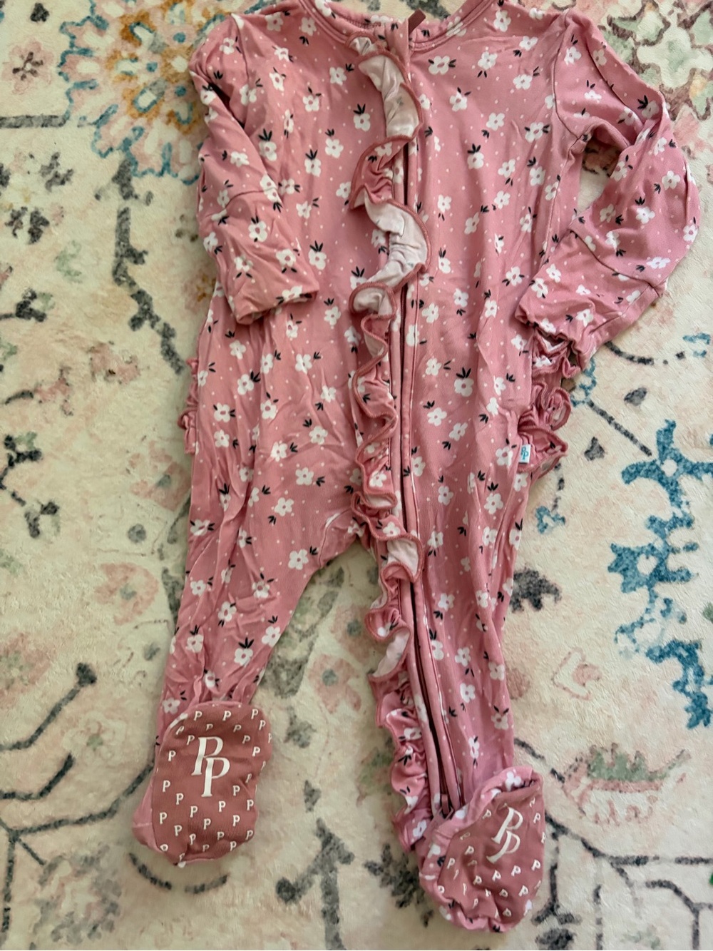 Posh Peanut Pink Floral Ruffle Footed One-Piece